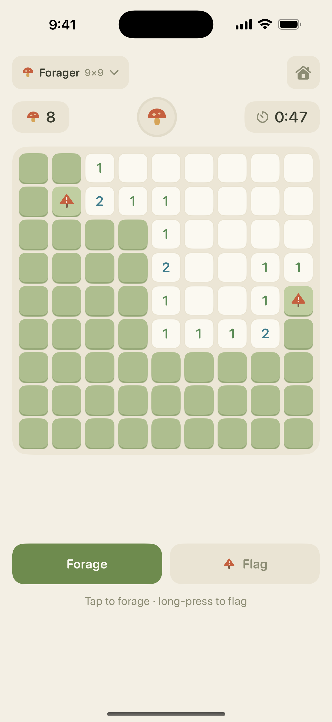 Mid-game board with revealed numbers and two flagged mushrooms.